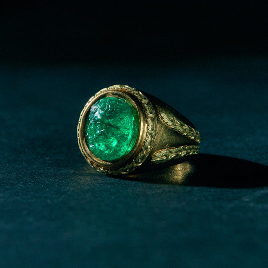 Carved Emerald Mounted in French 18 carat Gold Ring